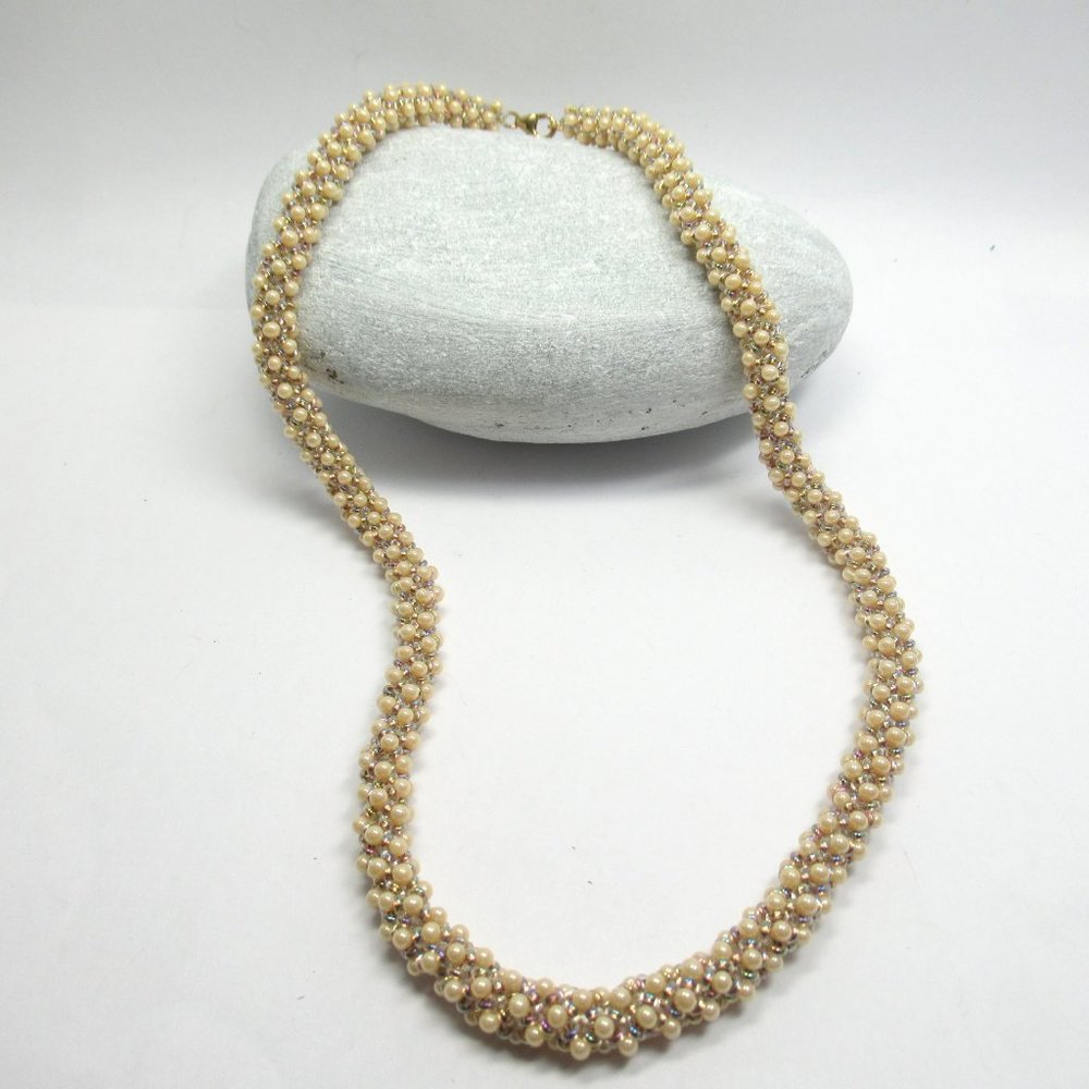Hand stitched drop necklace